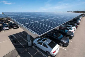 Covering-parking-lots-with-Solar-Panels-providing-Shade-and-Generating-Electricity-to-charge-Electri
